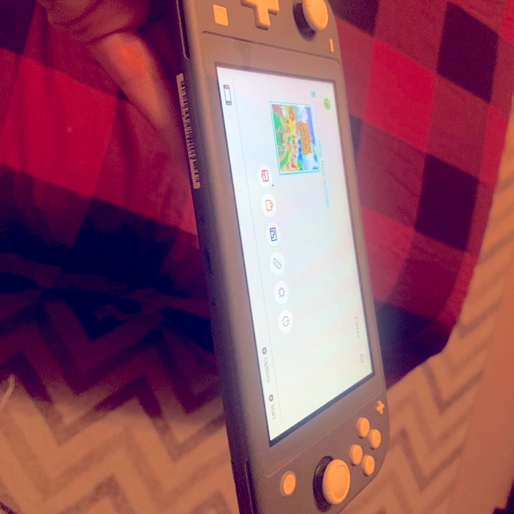 Switch lite, BRAND NEW. Used once